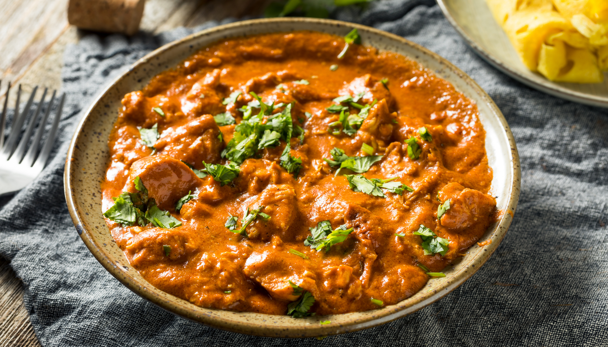 Tandoori chicken simmered in a velvety tomato-butter sauce—mildly spiced and incredibly indulgent.