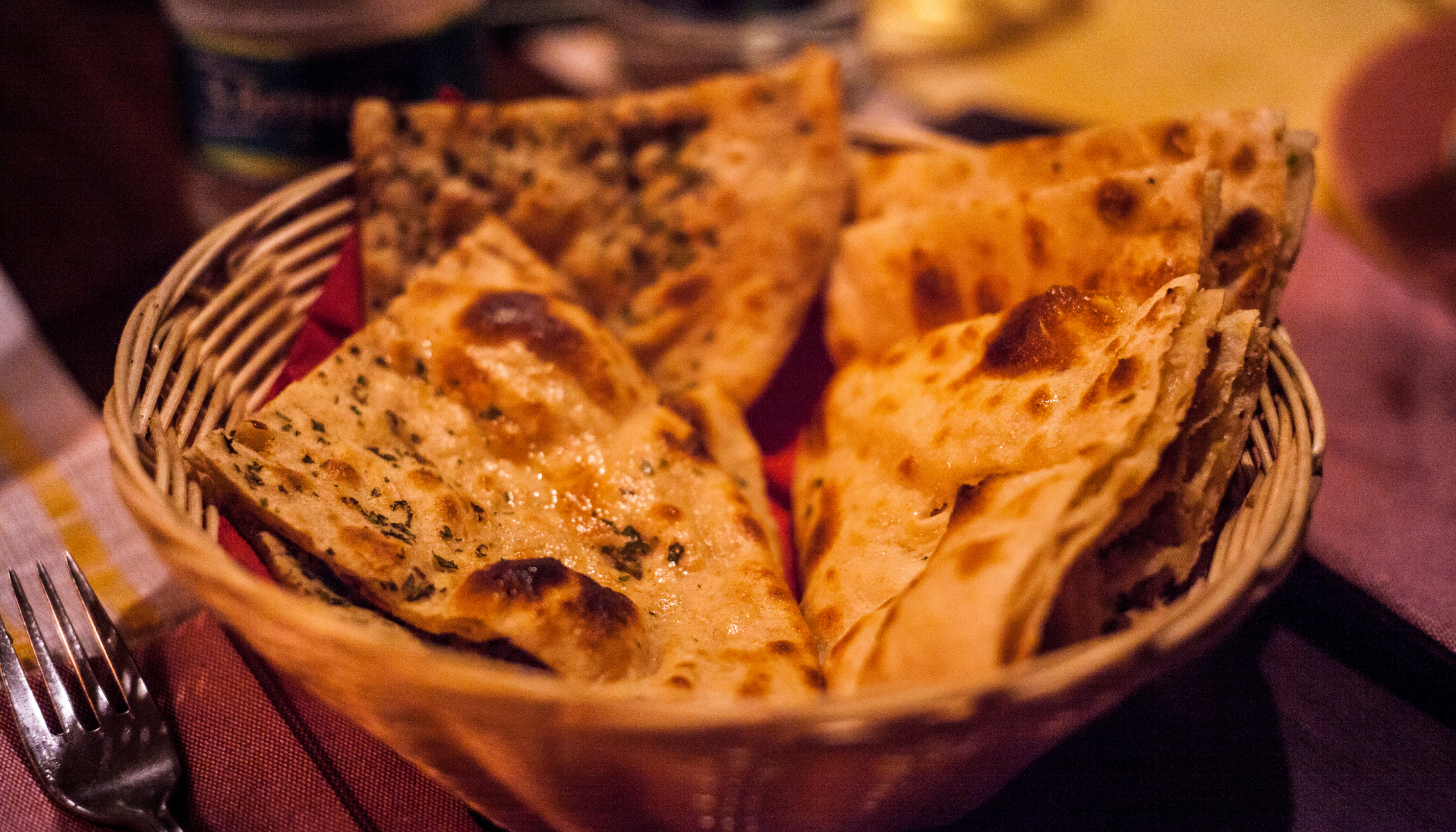 Soft and leavened oven-baked flatbread brushed with a generous layer of melted butter.