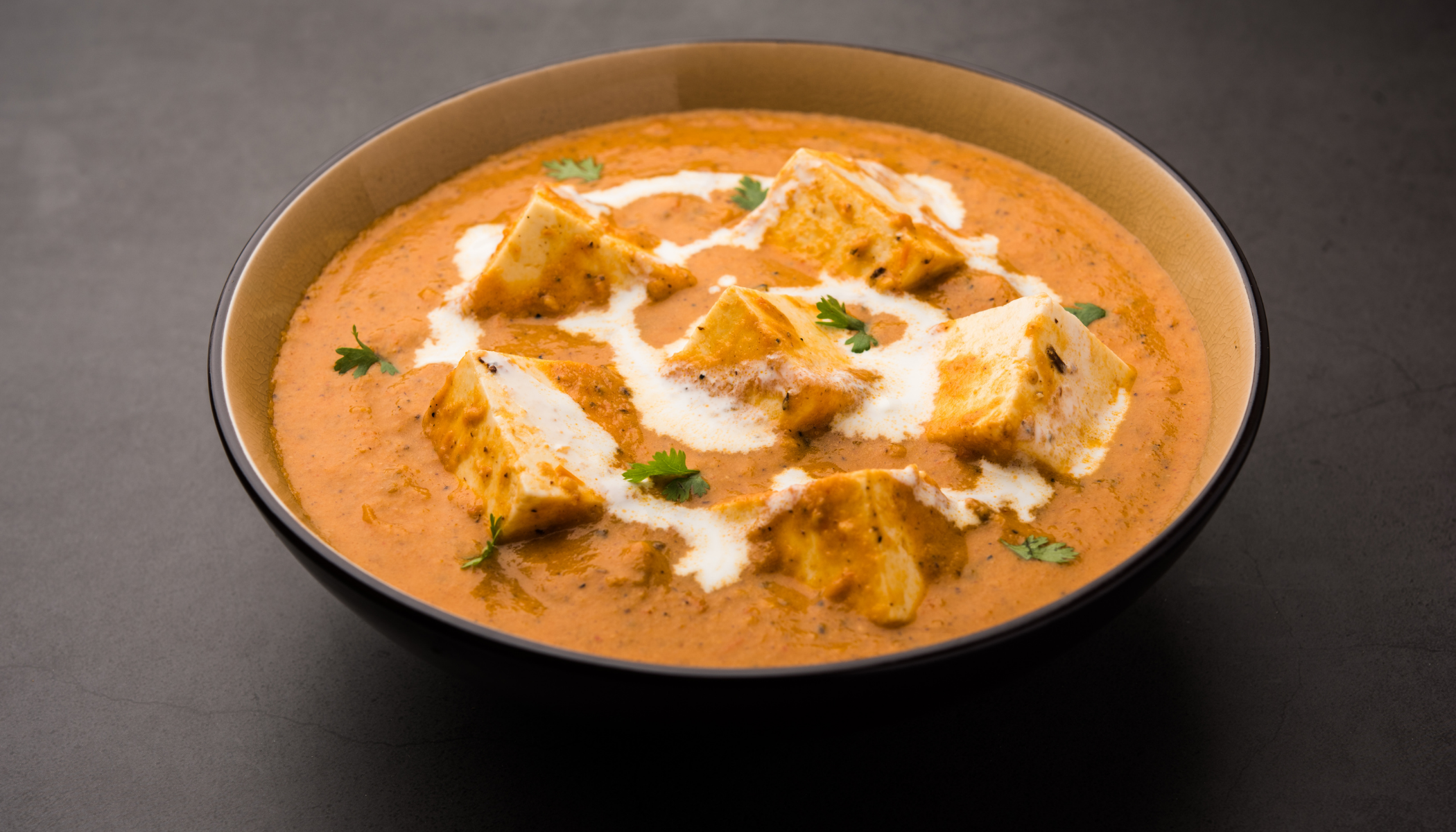 Soft paneer cubes simmered in a creamy, buttery tomato-based gravy, perfectly balanced with spices.